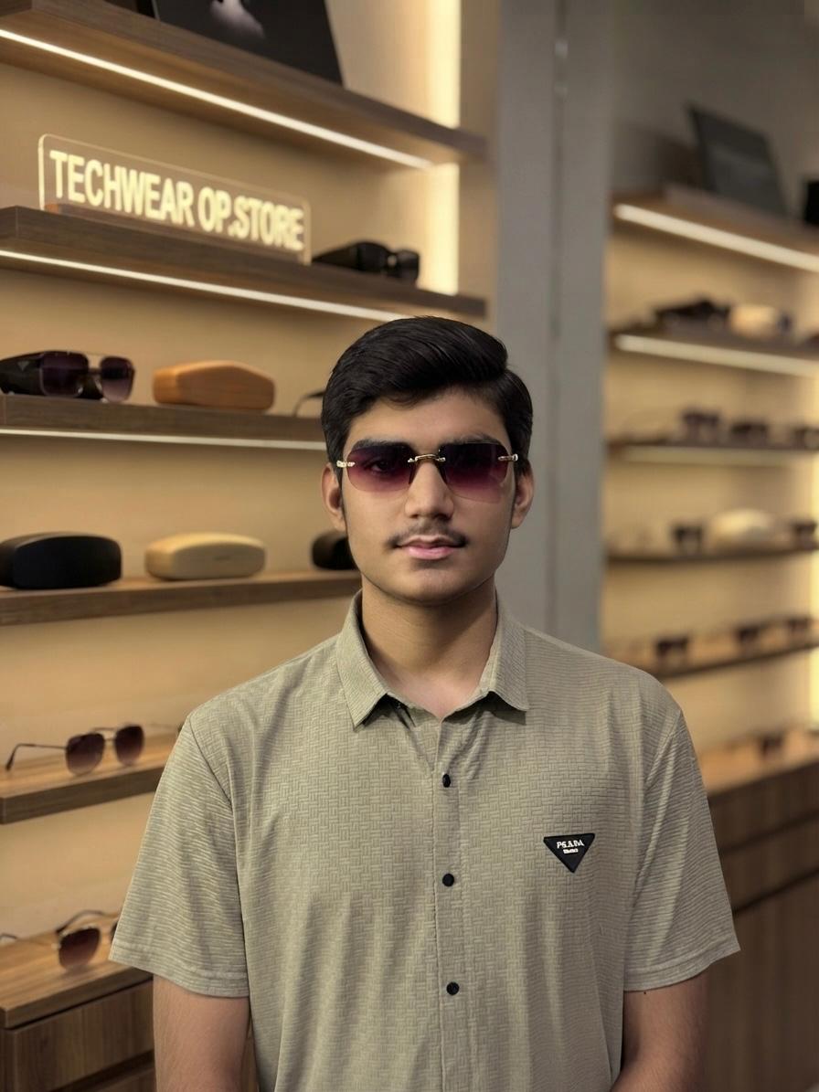 Luxury Purple Tinted Rimless Sunglasses with Golden Temples - Image 2